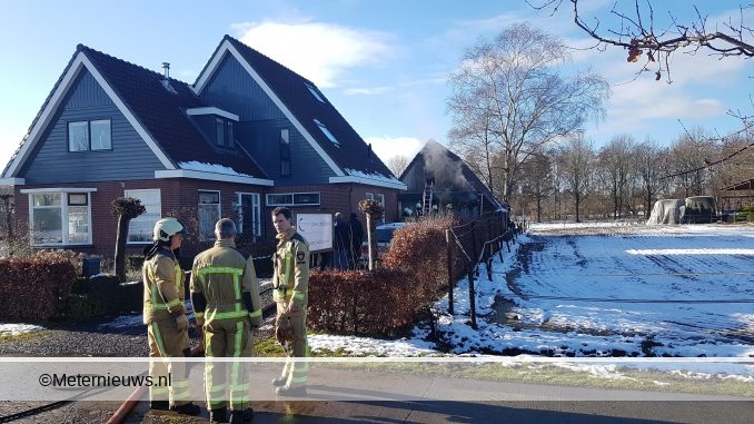 BINNENBRAND IN SCHUUR ACHTER HUIS IN ERICA2