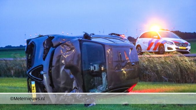 auto over de kop Emmercompascuum