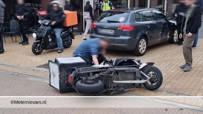 bezorgscooter tegen auto in Groningen